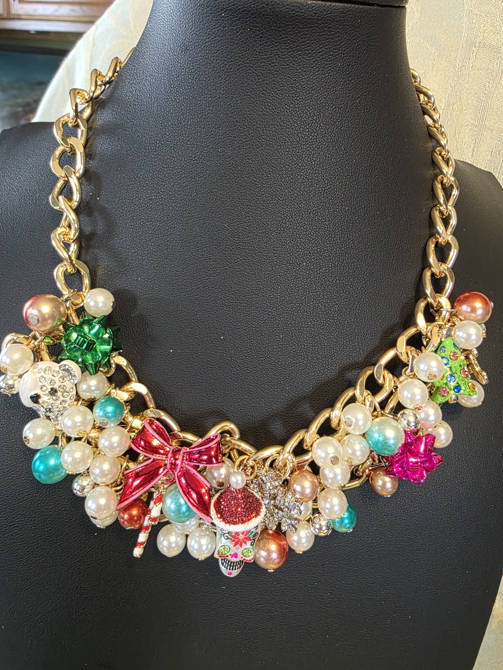 #328 Betsey Johnson Gold Tone Necklace w/Red, Green, Pink and Turquoise Charms